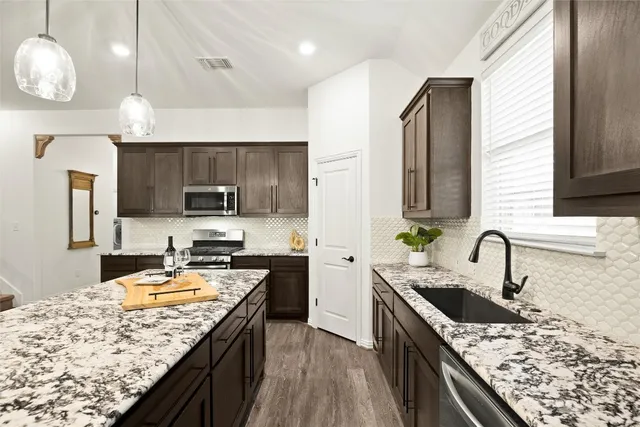 a bedroom with a bed and a walk in closet