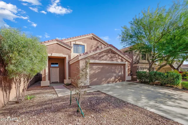 a view of storage and utility room with washer and dryer