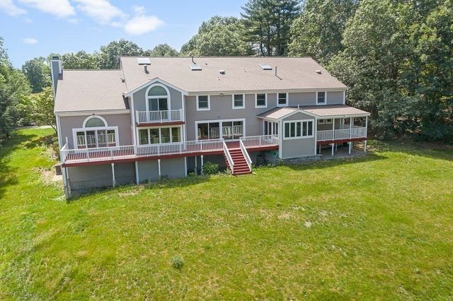 a aerial view of a house with a garden and plants