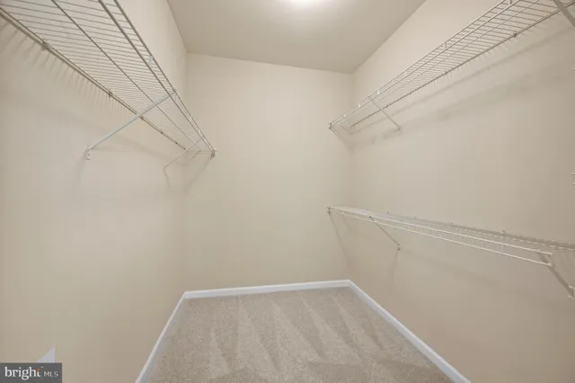 a view of a room with racks on the wall