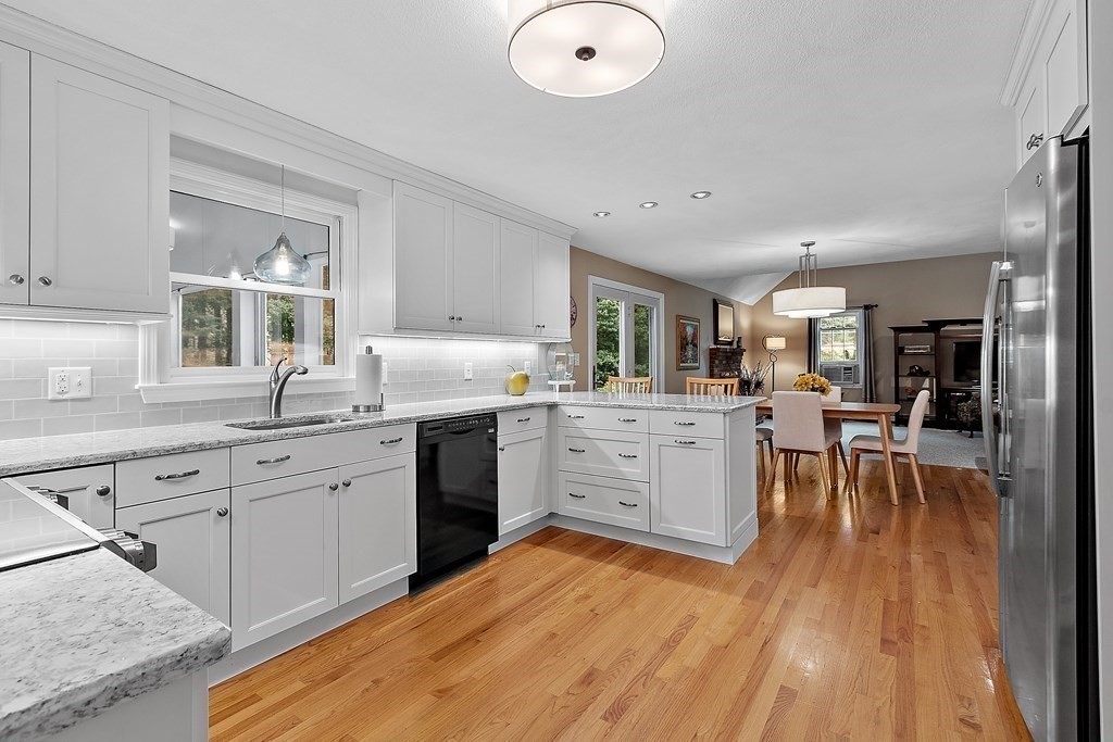 318 Reed Farm Road Boxborough, MA 01719 - Photo 11 of 42 a kitchen with a sink window and cabinets