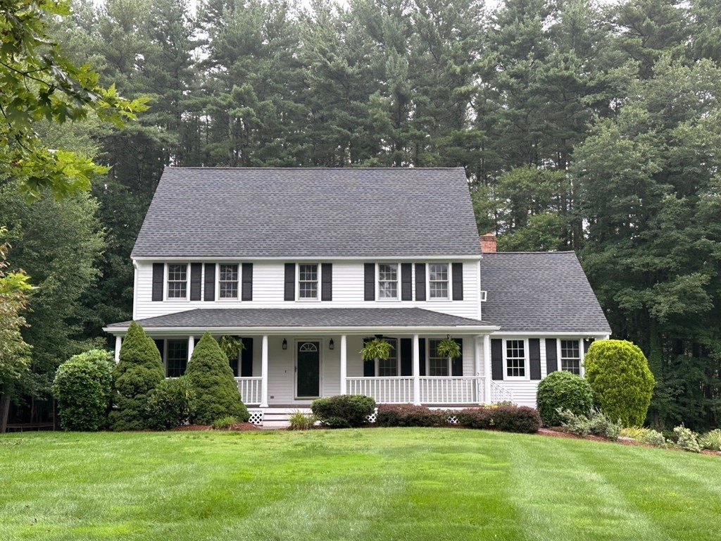 318 Reed Farm Road Boxborough, MA 01719 - Photo 2 of 42 a aerial view of a house with yard and green space