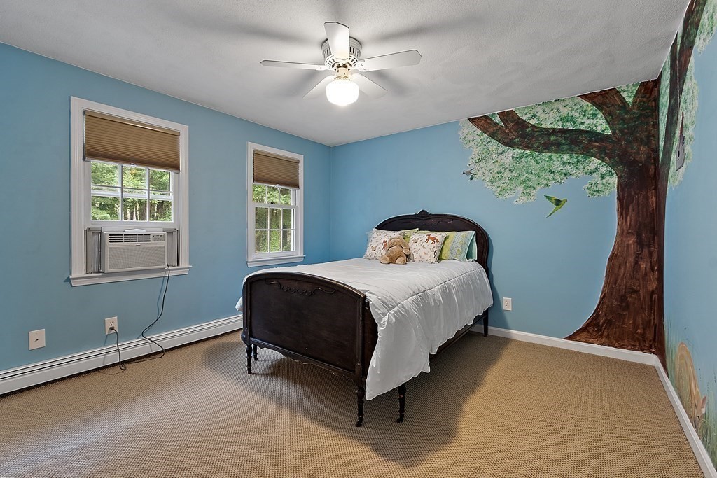 318 Reed Farm Road Boxborough, MA 01719 - Photo 29 of 42 a bedroom with a bed and a window