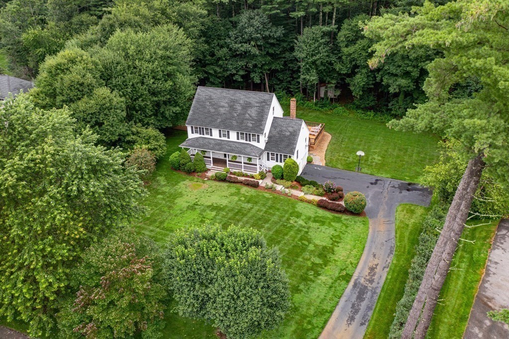 318 Reed Farm Road Boxborough, MA 01719 - Photo 39 of 42 a view of a backyard with wooden fence