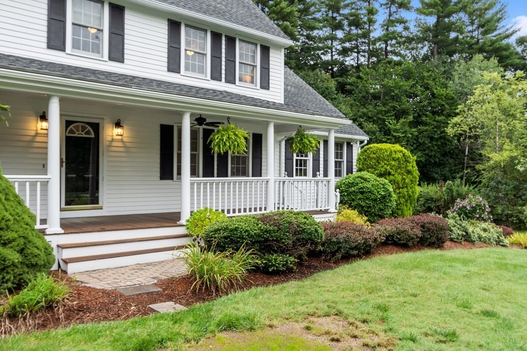 318 Reed Farm Road Boxborough, MA 01719 - Photo 4 of 42 front view of a house with a yard