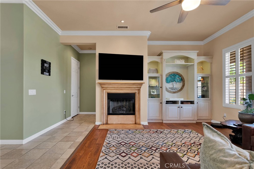 10686 Archerwill Road Apple Valley, CA 92308 - Photo 11 of 55 a bedroom with a bed and a fireplace