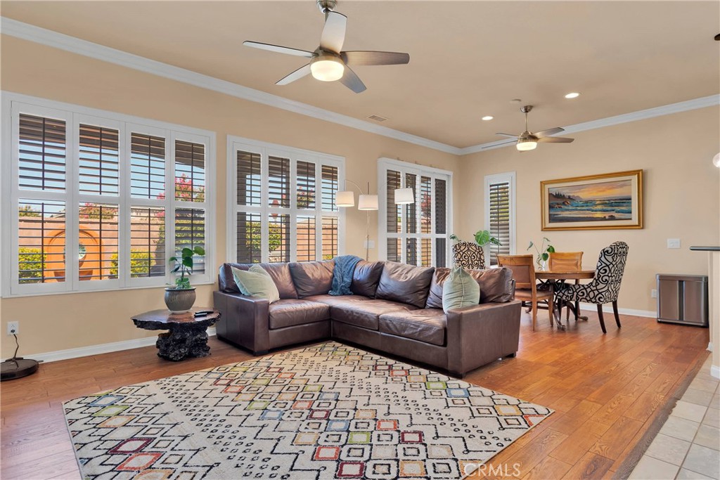 10686 Archerwill Road Apple Valley, CA 92308 - Photo 13 of 55 a living room with furniture and a window
