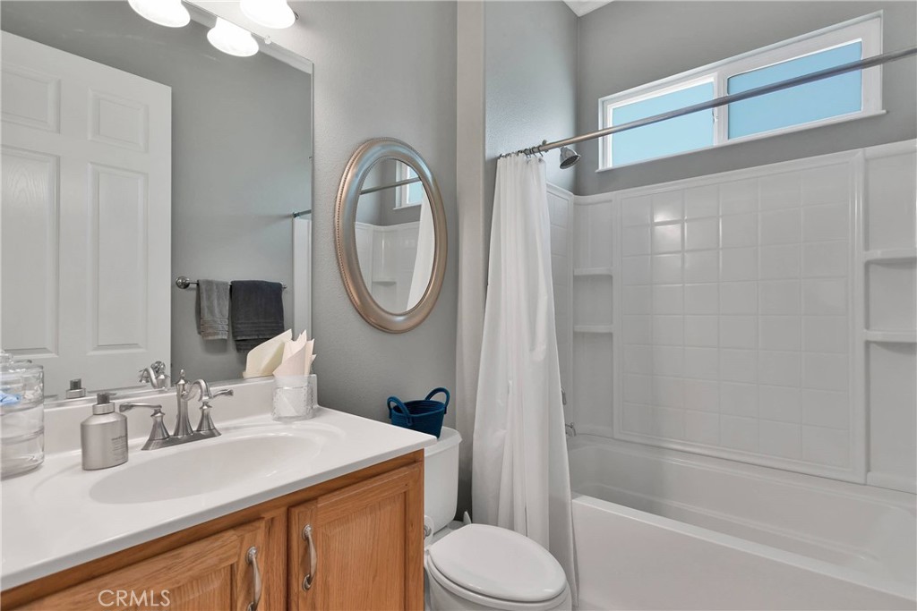 10686 Archerwill Road Apple Valley, CA 92308 - Photo 25 of 55 a bathroom with a sink toilet and shower