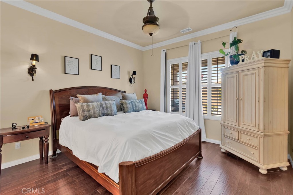 10686 Archerwill Road Apple Valley, CA 92308 - Photo 27 of 55 a bedroom with bed and wooden floor