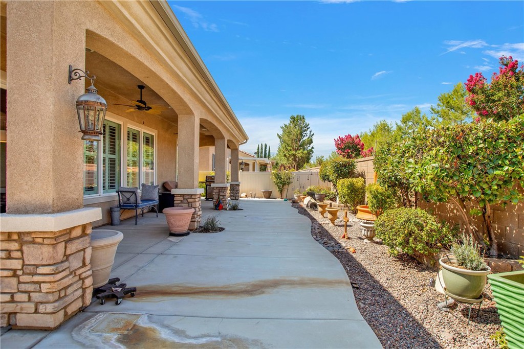 10686 Archerwill Road Apple Valley, CA 92308 - Photo 40 of 55 a view of a patio with couches and potted plants