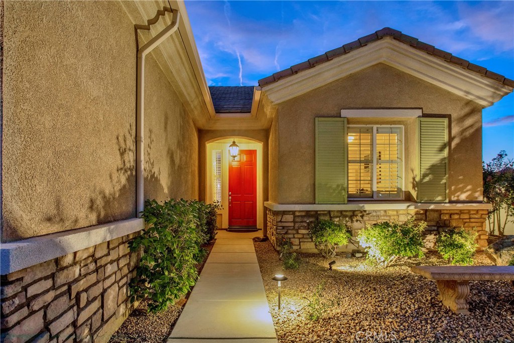 10686 Archerwill Road Apple Valley, CA 92308 - Photo 44 of 55 a front view of a house with a yard
