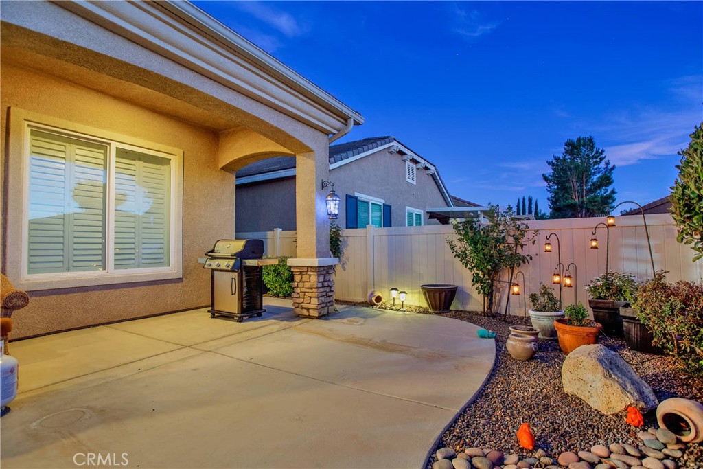 10686 Archerwill Road Apple Valley, CA 92308 - Photo 47 of 55 a front view of a house with outdoor seating