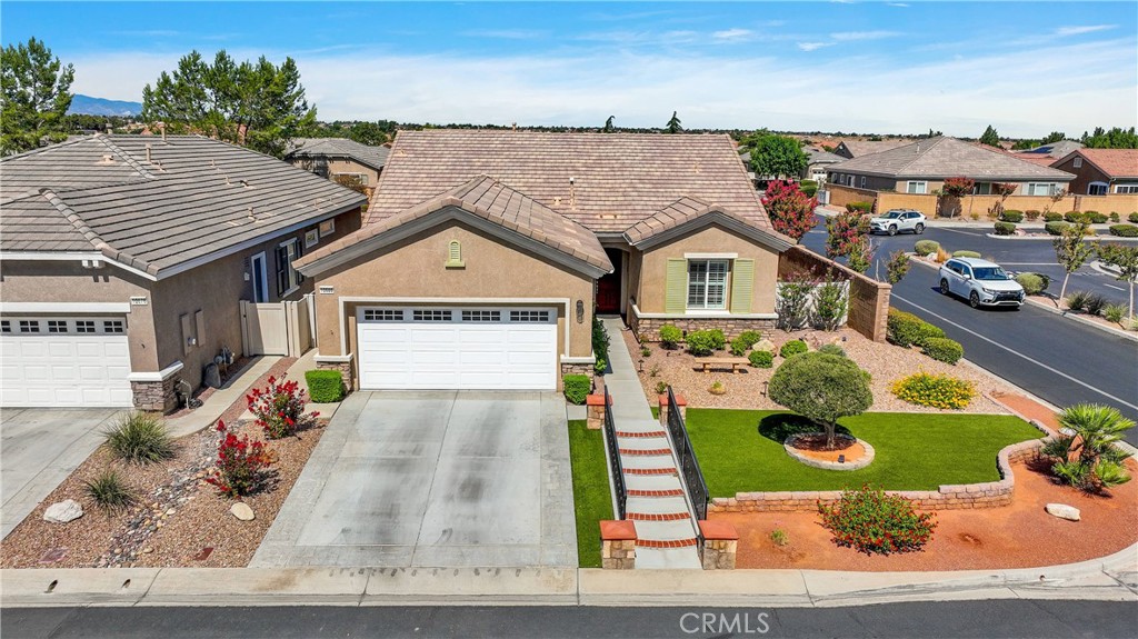 10686 Archerwill Road Apple Valley, CA 92308 - Photo 49 of 55 an aerial view of a house with swimming pool