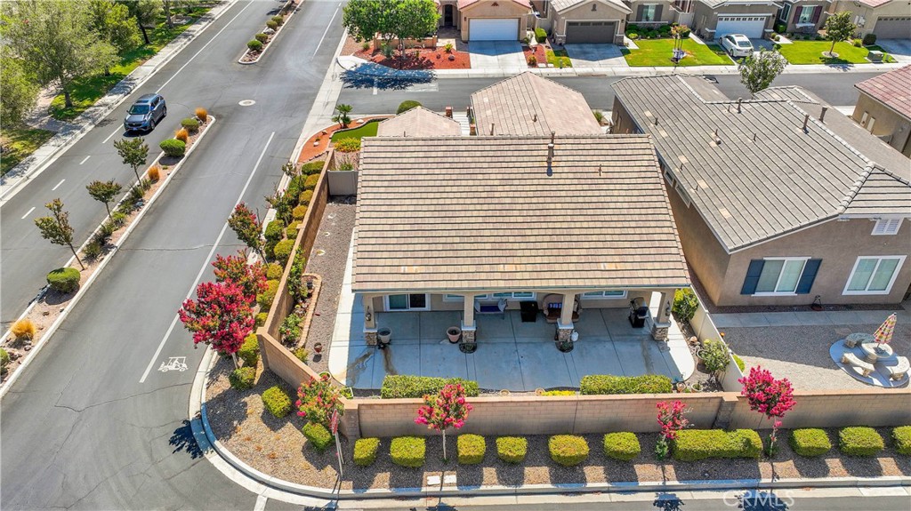 10686 Archerwill Road Apple Valley, CA 92308 - Photo 53 of 55 a view of a patio with table and chairs and potted plants