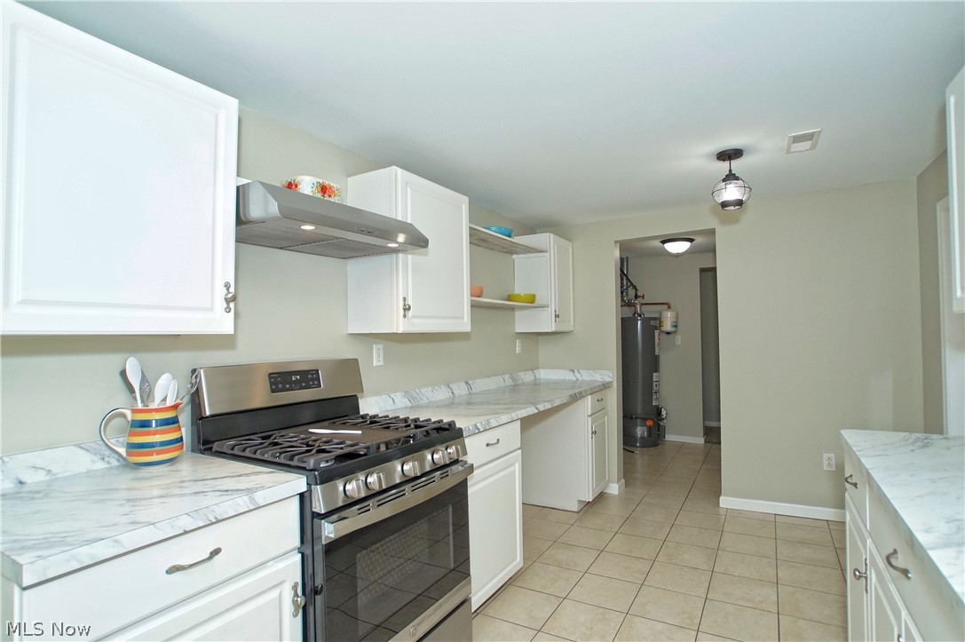 8063 Middlesex Road Mentor, OH 44060 - Photo 9 of 35 Cooking will be a delight with your new gas range and exhaust fan.