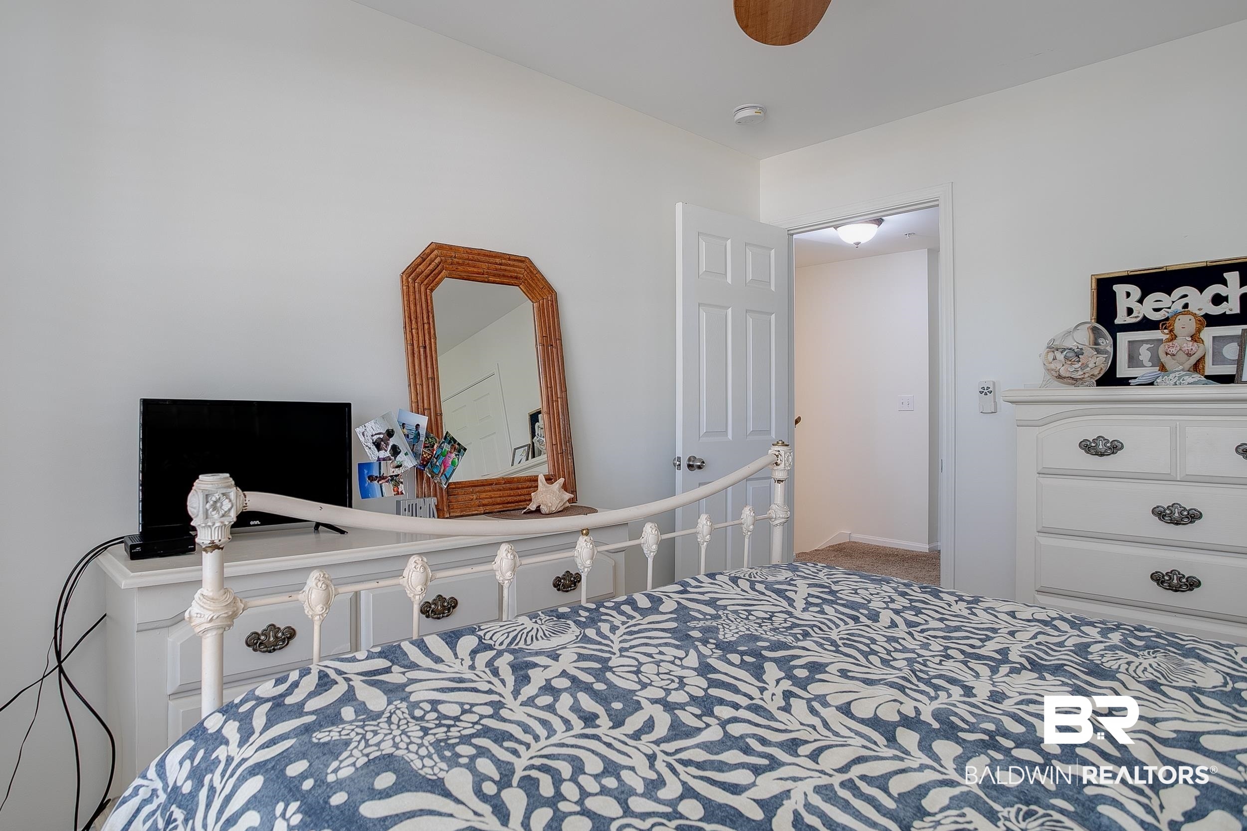 1517 Regency Road, Unit 33 Gulf Shores, AL 36542 - Photo 21 of 29 View of carpeted bedroom
