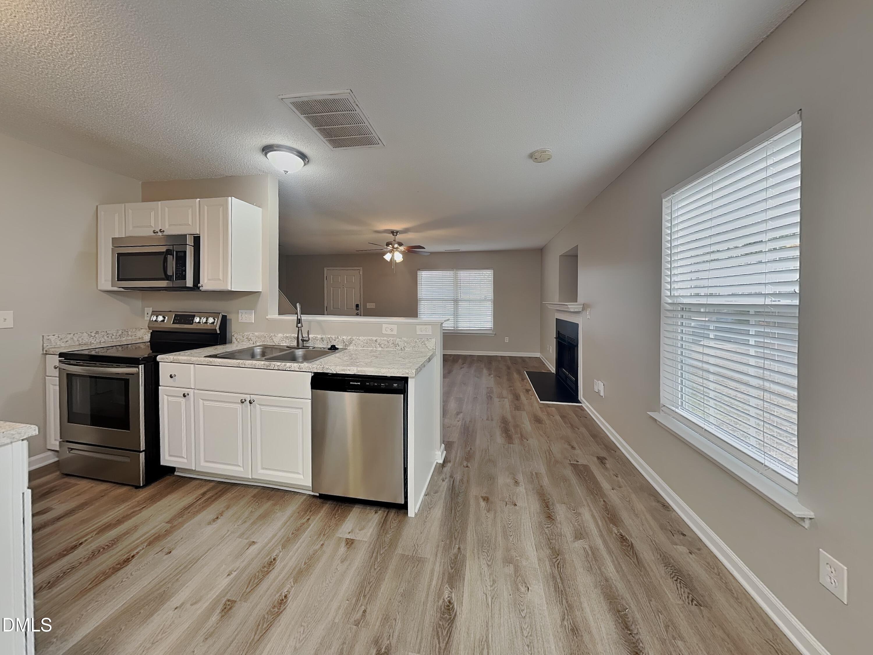 5709 Bryanstone Place Raleigh, NC 27610 - Photo 5 of 15 4_Image_kjYkuadCky