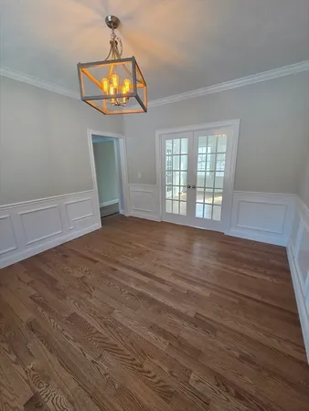 a view of empty room with windows