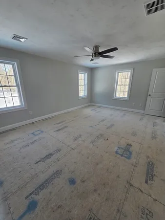 a view of a room with racks on the wall