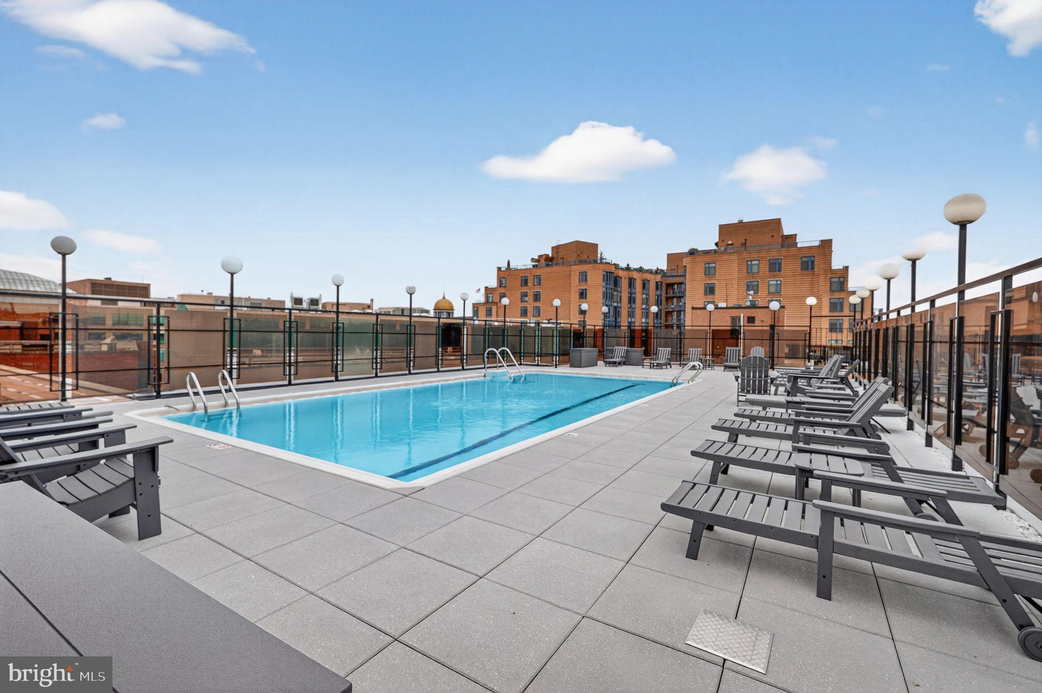 1420 N Street Northwest, Unit 1013 Washington, DC 20005 - Photo 14 of 27 a view of a terrace with chairs