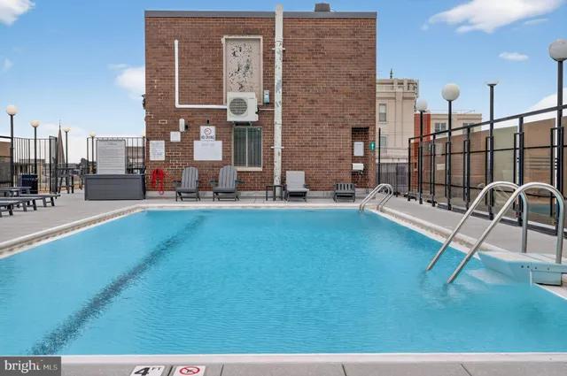 a swimming pool with outdoor view