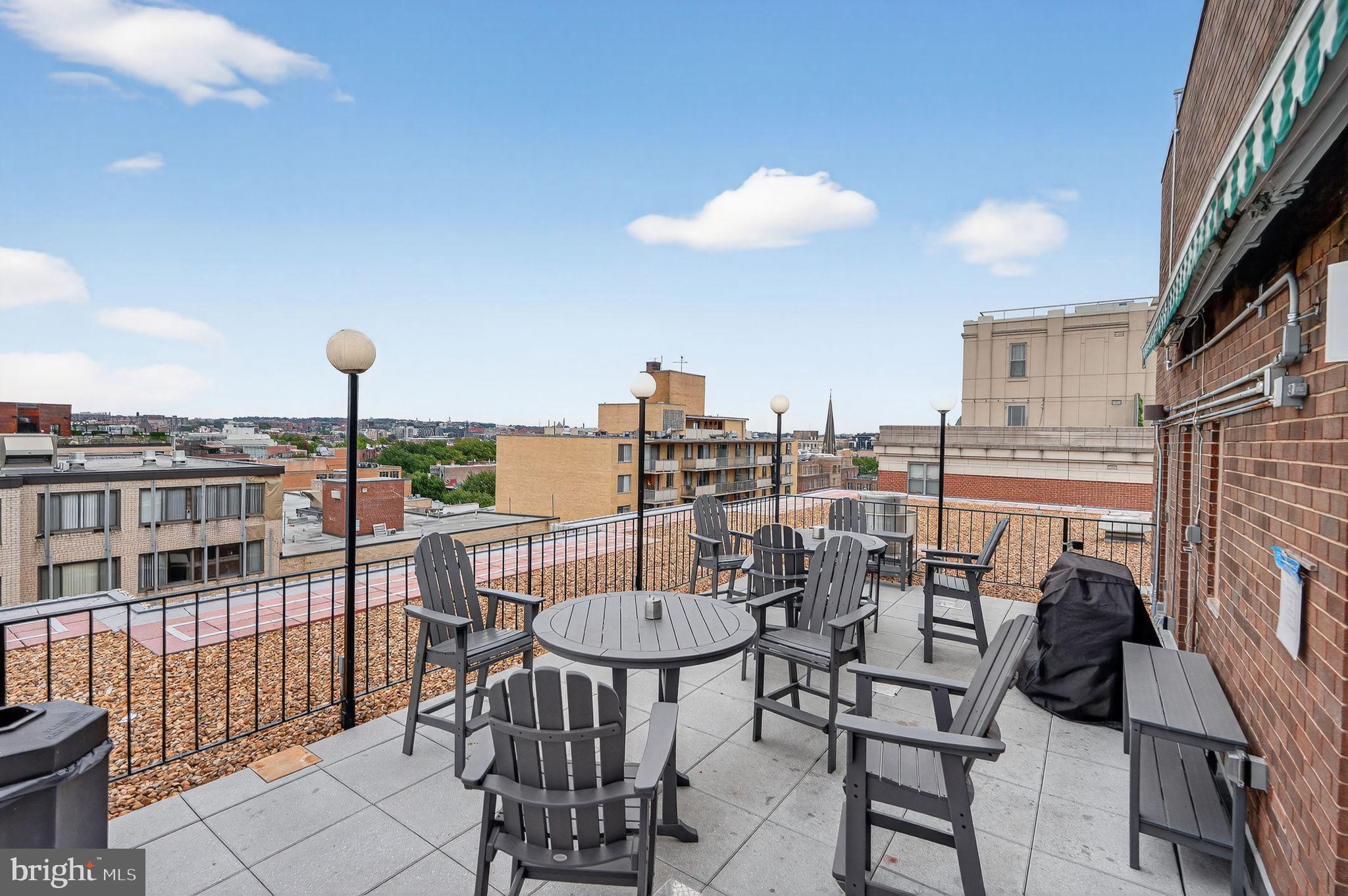 1420 N Street Northwest, Unit 1013 Washington, DC 20005 - Photo 17 of 27 a view of a chairs and table in the balcony