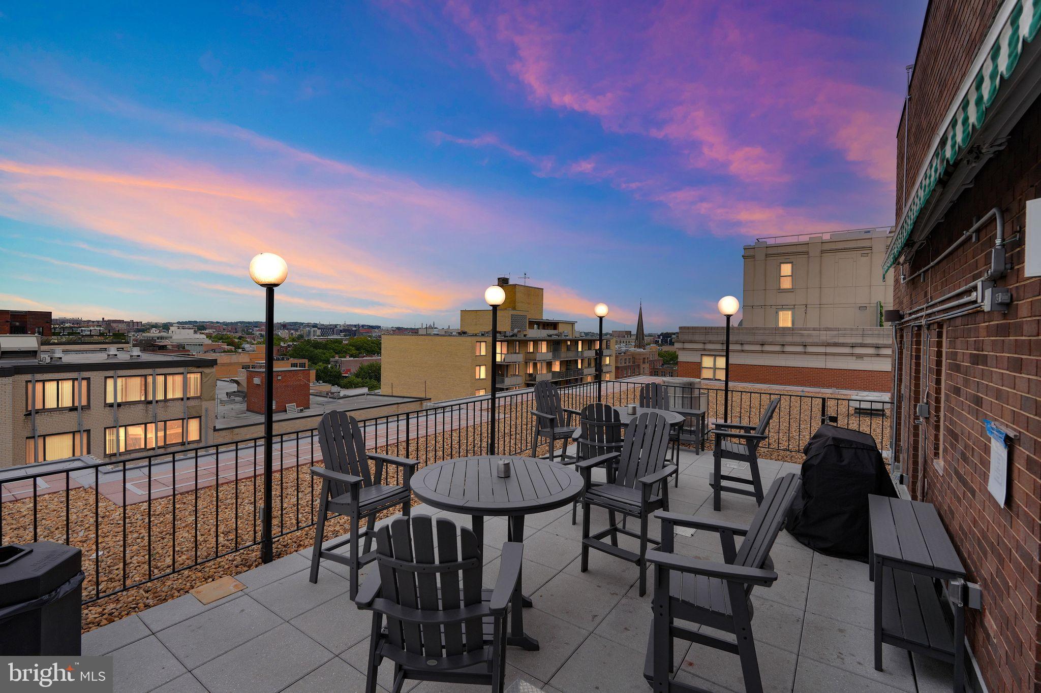 1420 N Street Northwest, Unit 1013 Washington, DC 20005 - Photo 20 of 27 a view of a chairs and table in the balcony