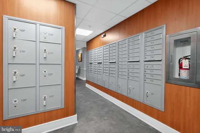 a view of a building with car parked