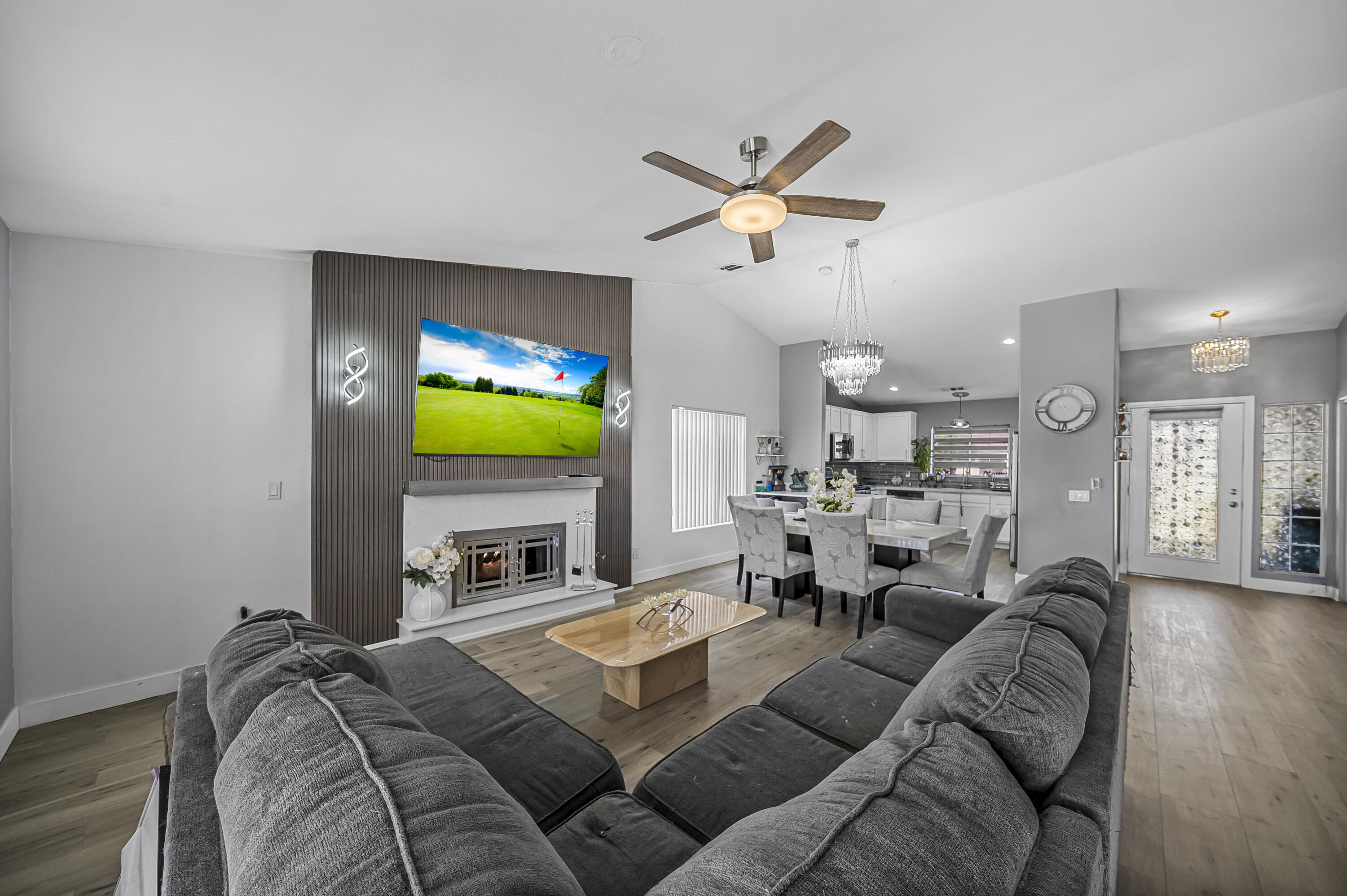 33860 Bell Road Thousand Palms, CA 92276 - Photo 16 of 56 a living room with furniture and a flat screen tv