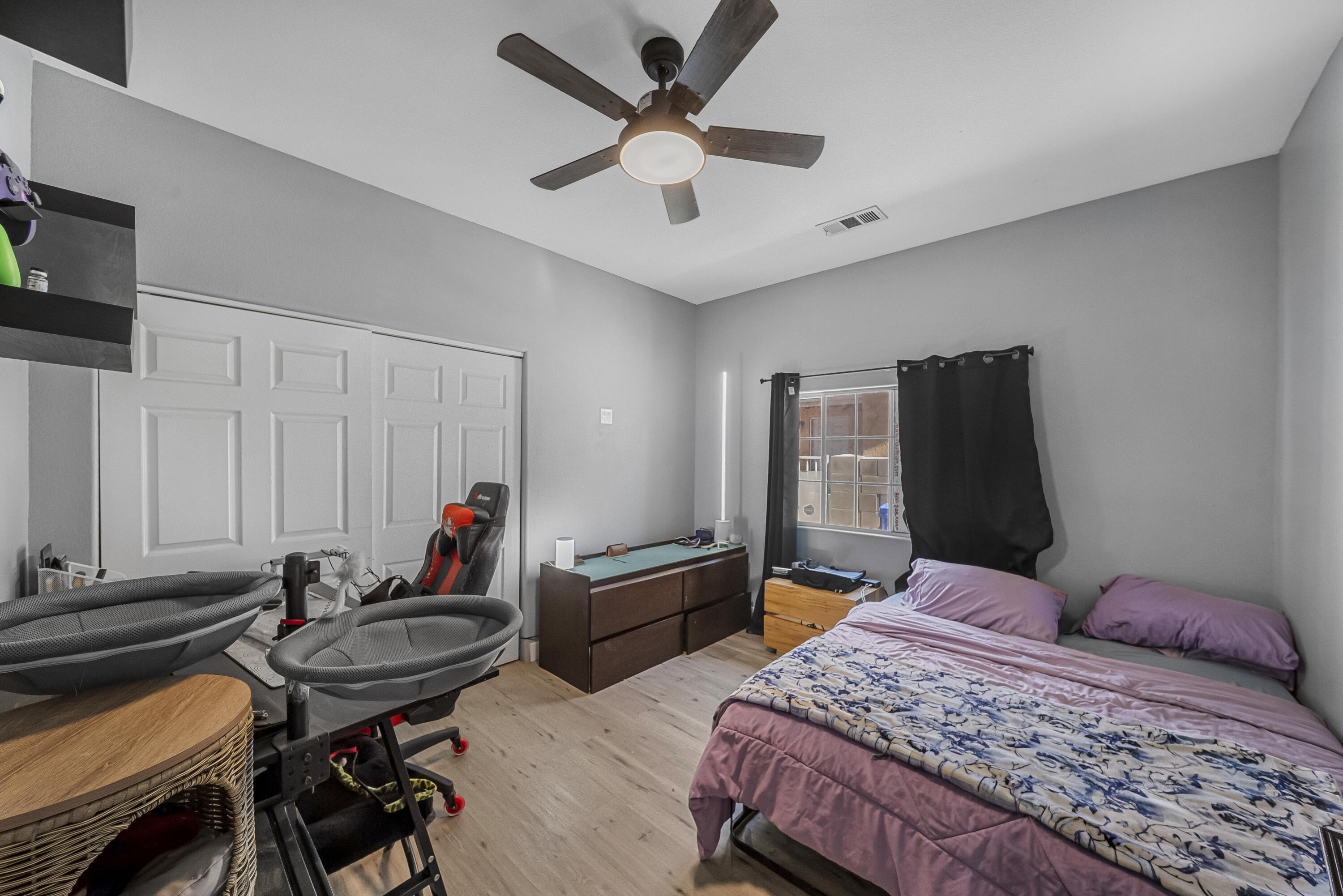 33860 Bell Road Thousand Palms, CA 92276 - Photo 19 of 56 a bedroom that has a bed and a chair in it