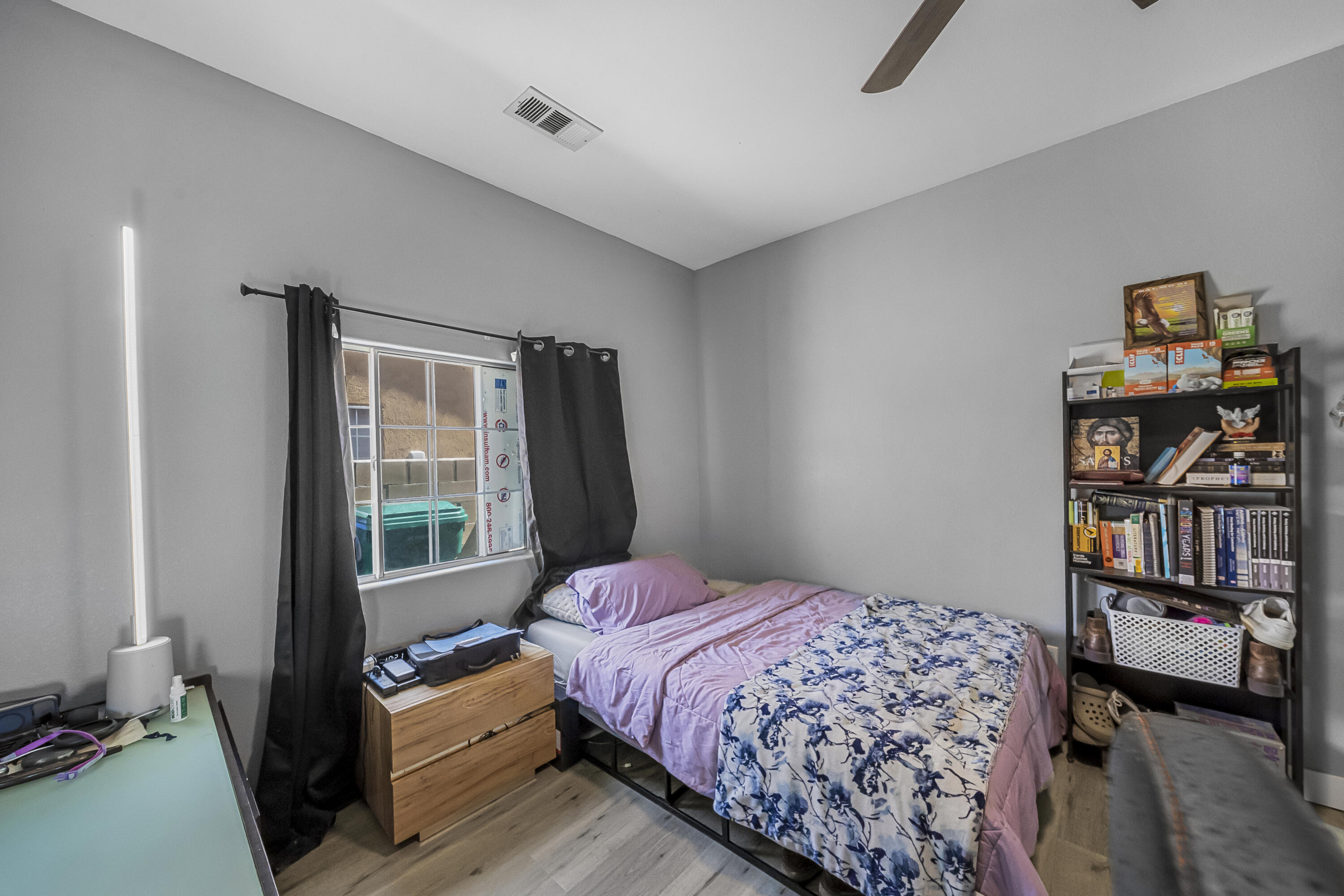 33860 Bell Road Thousand Palms, CA 92276 - Photo 20 of 56 a bedroom with a bed furniture and a window