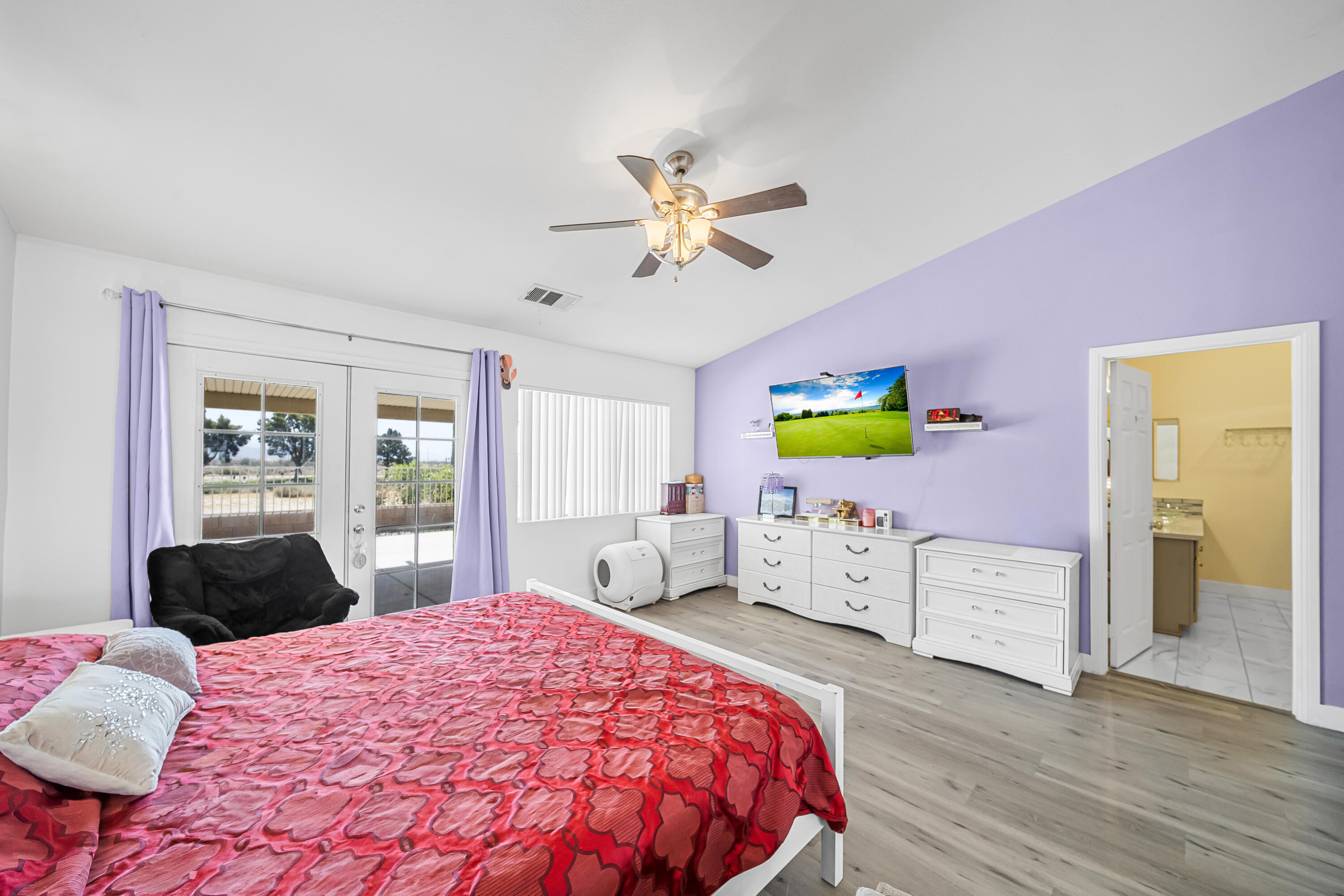 33860 Bell Road Thousand Palms, CA 92276 - Photo 24 of 56 a bedroom with a bed and a dresser in it