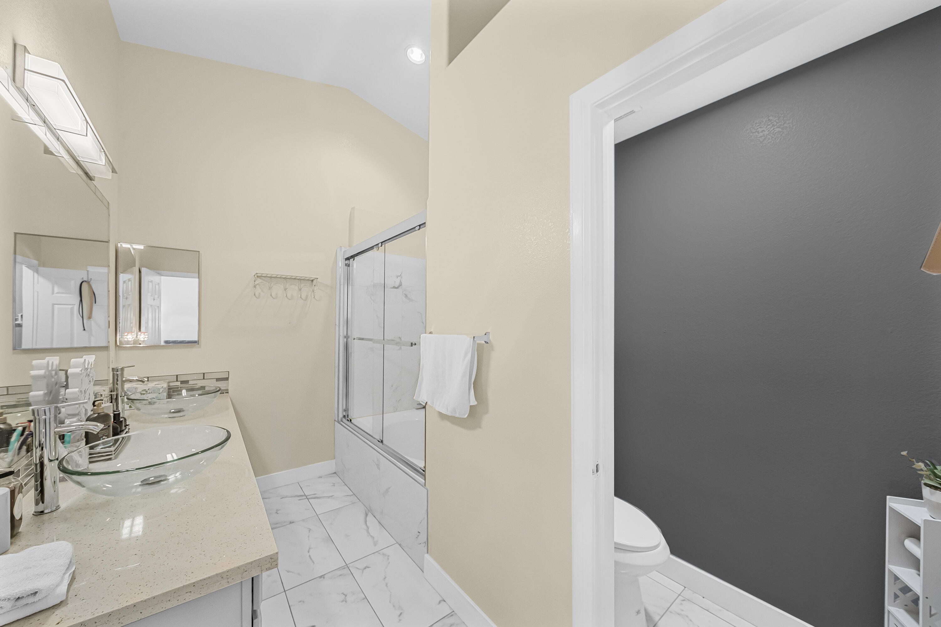33860 Bell Road Thousand Palms, CA 92276 - Photo 25 of 56 a bathroom with a sink a toilet and shower
