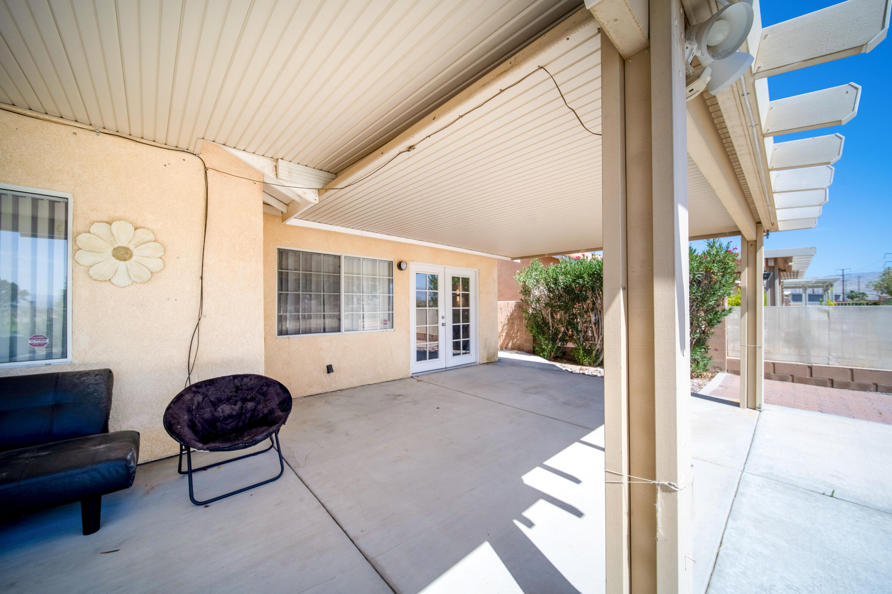 33860 Bell Road Thousand Palms, CA 92276 - Photo 34 of 56 a living room with furniture a large window