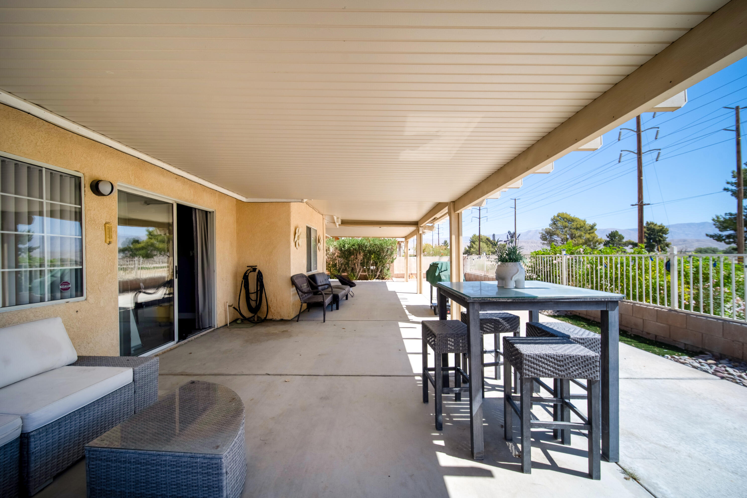 33860 Bell Road Thousand Palms, CA 92276 - Photo 36 of 56 a view of a dining room with furniture window and outside view