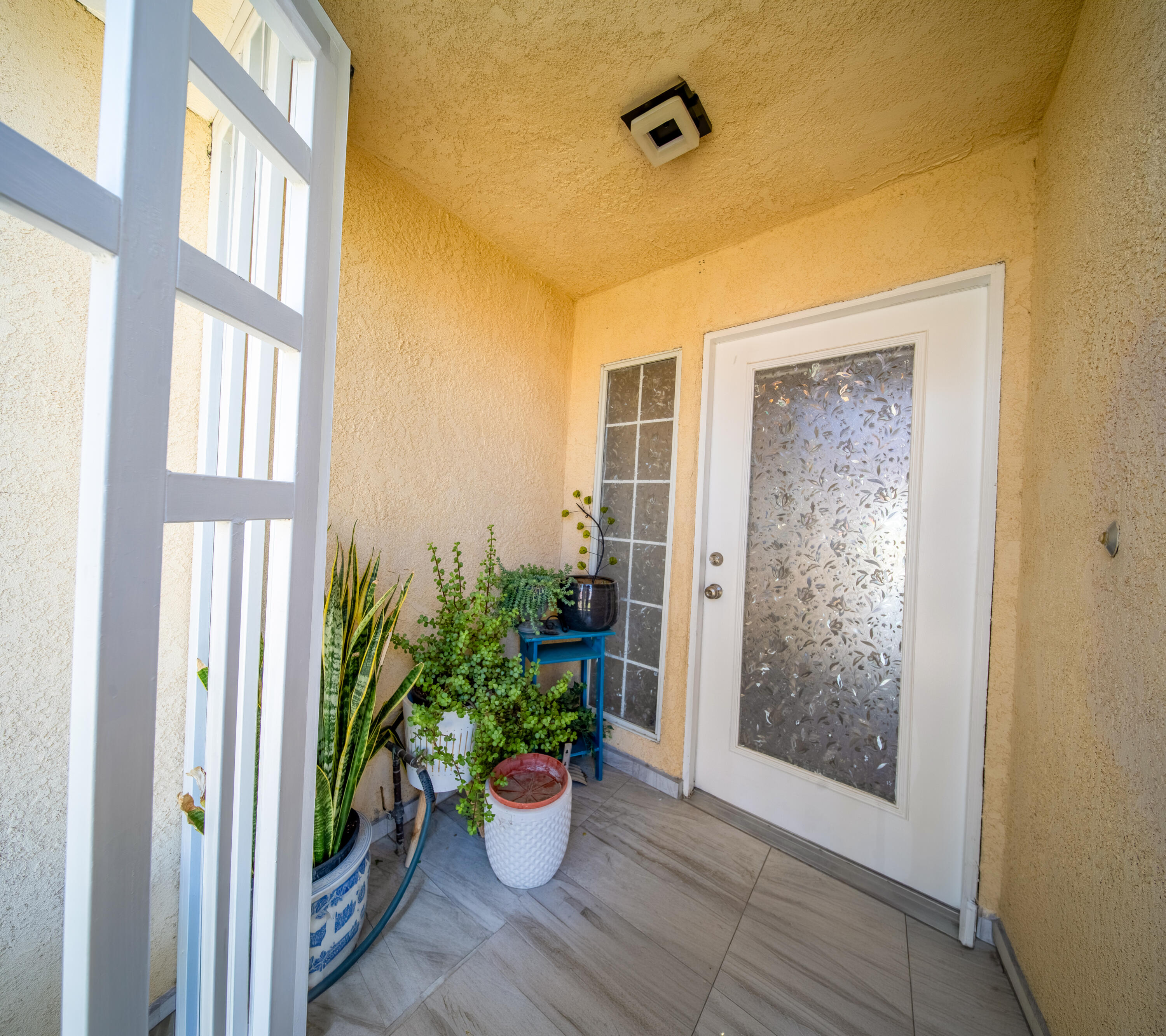 33860 Bell Road Thousand Palms, CA 92276 - Photo 39 of 56 a view of a entryway door of the house