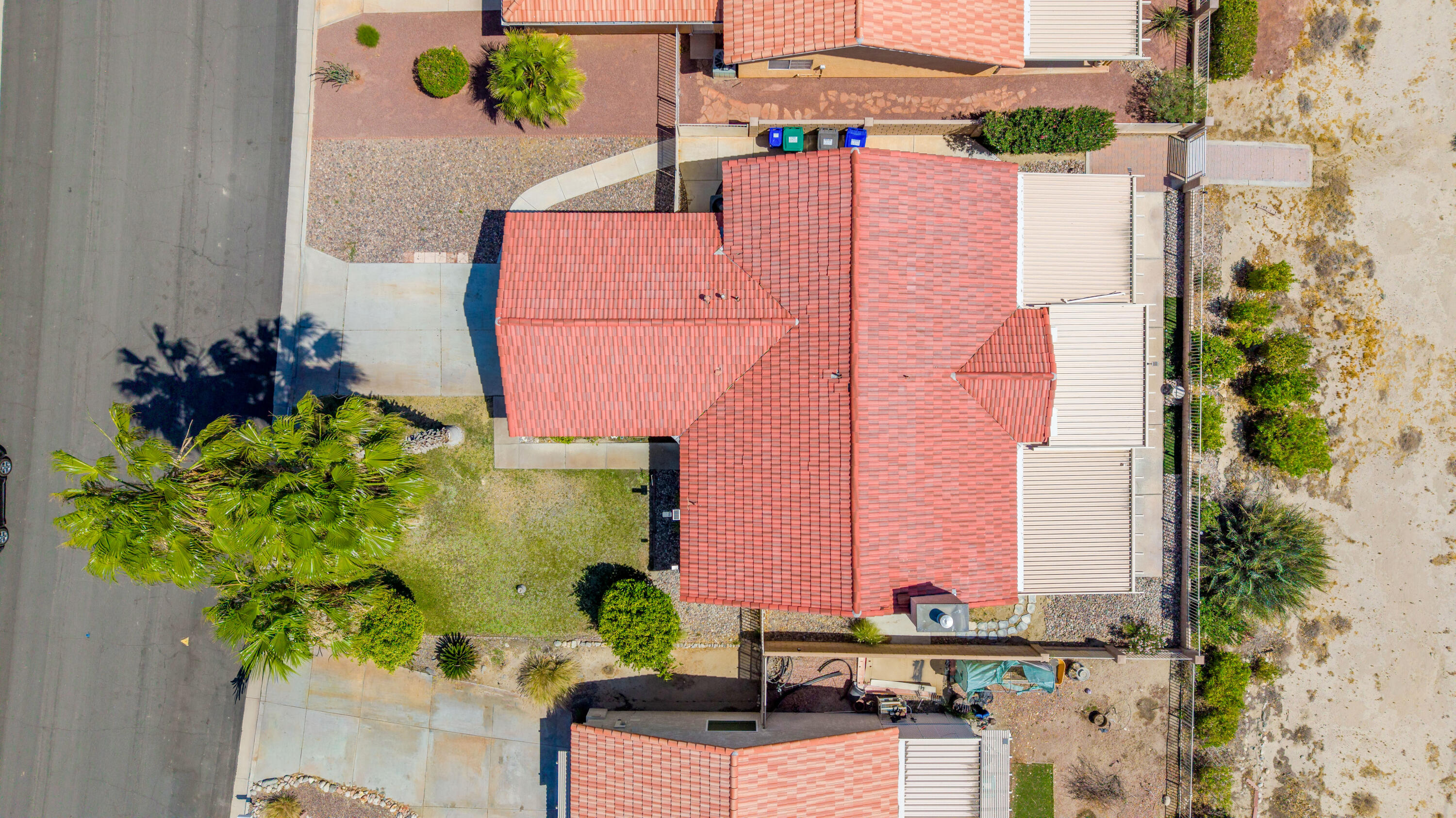 33860 Bell Road Thousand Palms, CA 92276 - Photo 49 of 56 an aerial view of a house with a yard and a potted plant