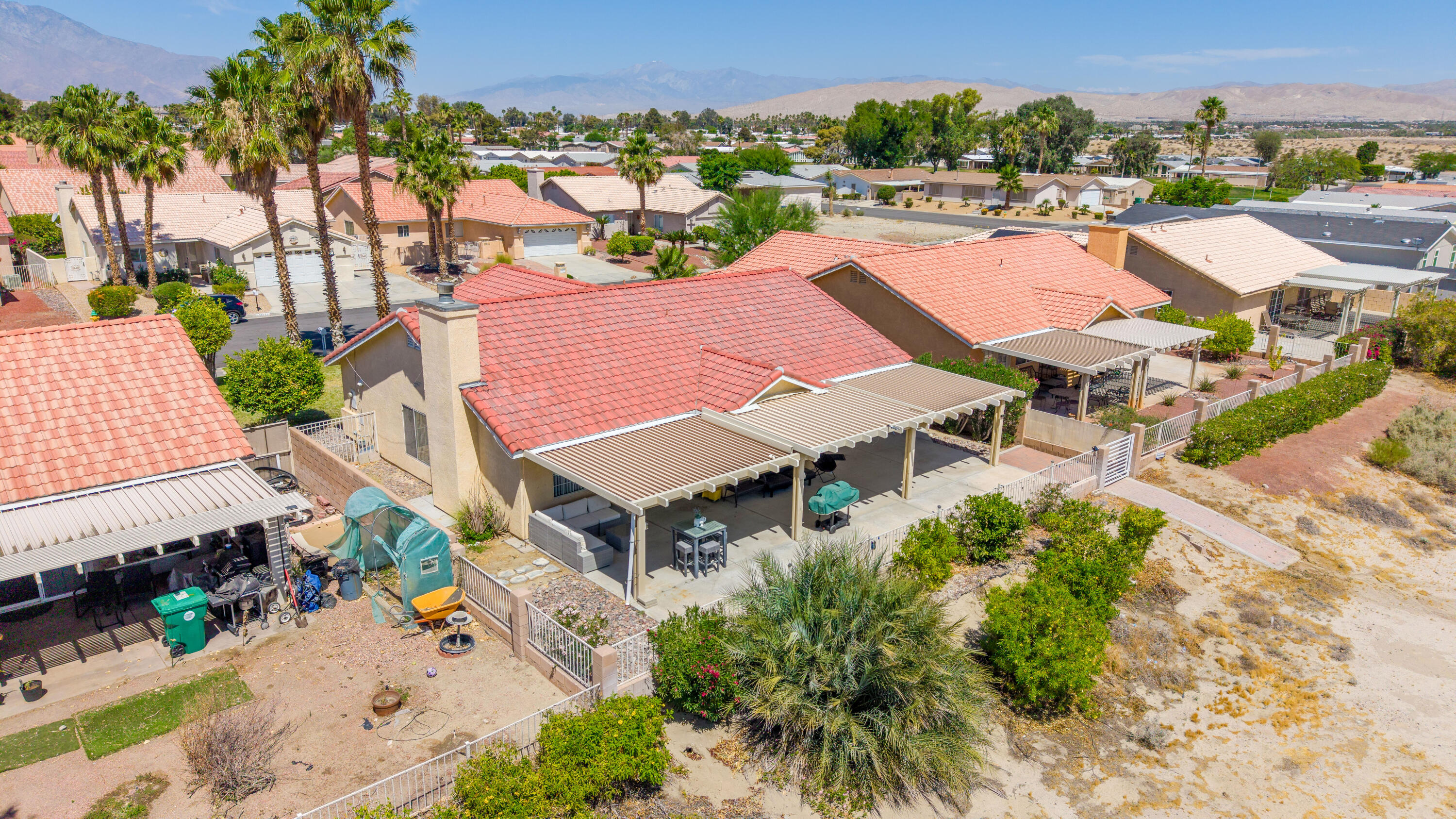 33860 Bell Road Thousand Palms, CA 92276 - Photo 51 of 56 an aerial view of a house with a yard and lake view