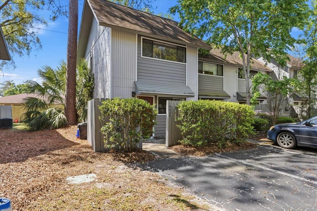 4435 Northwest 41st Place Gainesville, FL 32606 - Photo 1 of 1 a view of a house with a yard