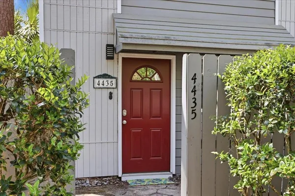 a view of a door of the house and front of a house