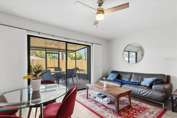 a living room with furniture and a window