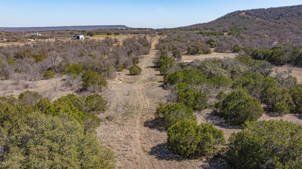 2263 South Main Street Gordon, TX 76453 - Photo 12 of 16 an aerial view of residential houses with outdoor space and trees