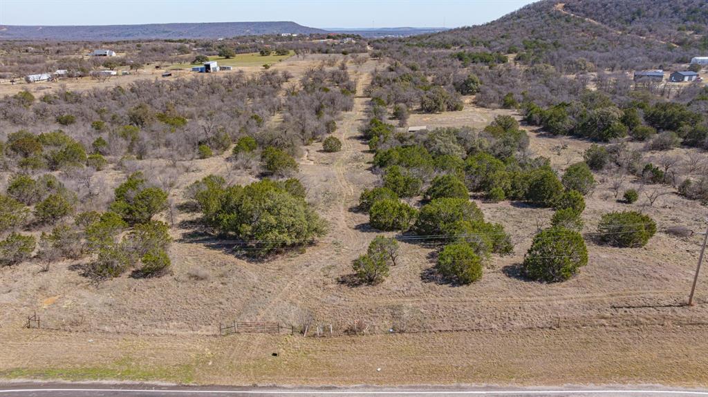 2263 South Main Street Gordon, TX 76453 - Photo 13 of 16 an aerial view of mountain with trees in the background