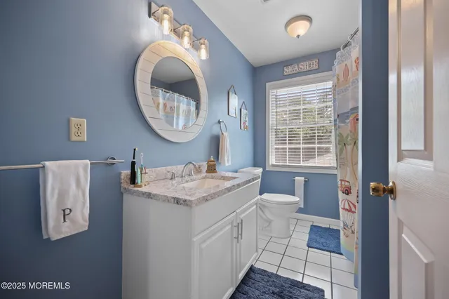 a view of a house with pool and chairs