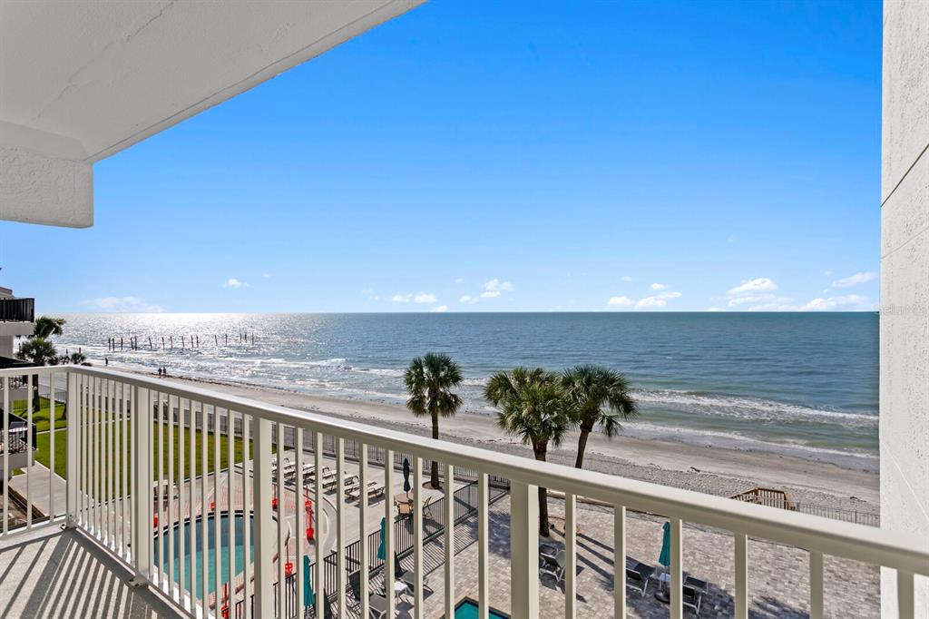16332 Gulf Boulevard, Unit 3B Redington Beach, FL 33708 - Photo 45 of 91 a view of a balcony with floor to ceiling window and outdoor space