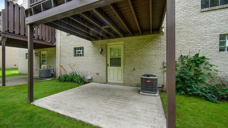 140 Terra Drive McKees Rocks, PA 15136 - Photo 24 of 25 Concrete pad under deck. Note glass block windows in lower level