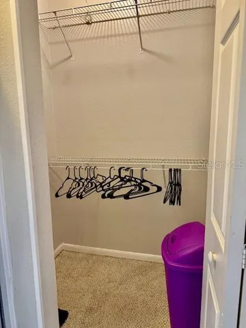 a stove top oven sitting inside of a kitchen