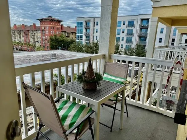 a stove top oven sitting inside of a kitchen