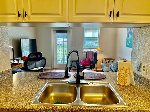 a workspace with furniture and window