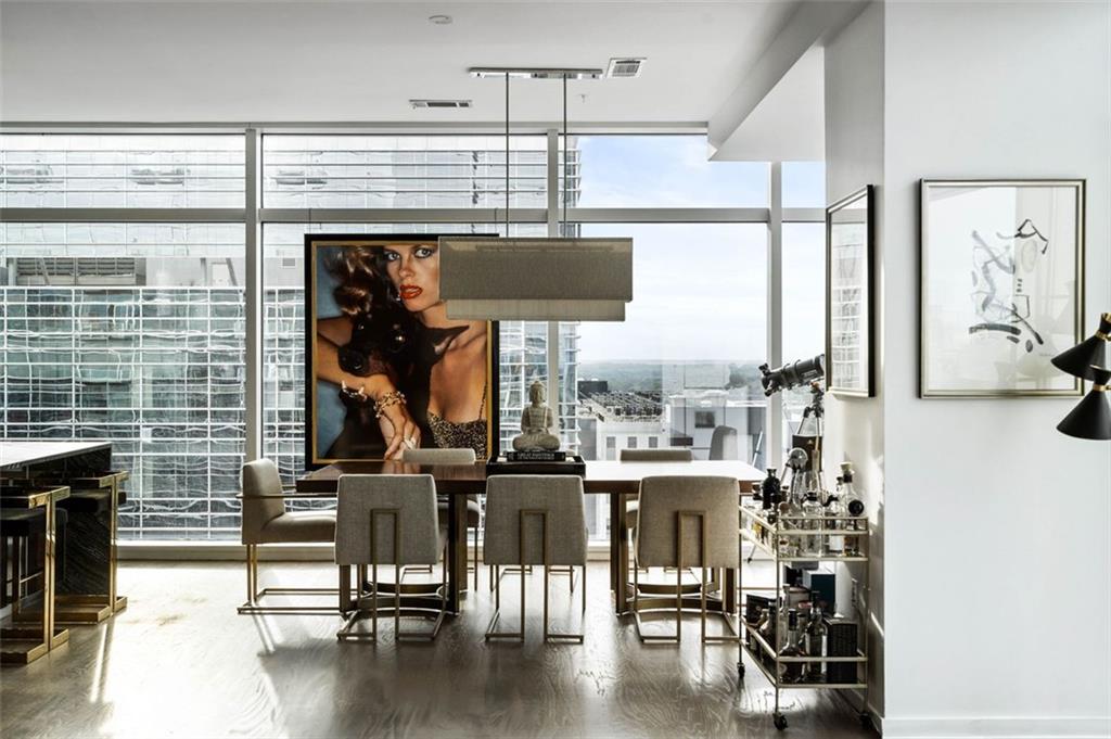 45 Ivan Allen Jr Boulevard Northwest, Unit 1702 Atlanta, GA 30308 - Photo 31 of 94 a view of a dining room with furniture window and outside view